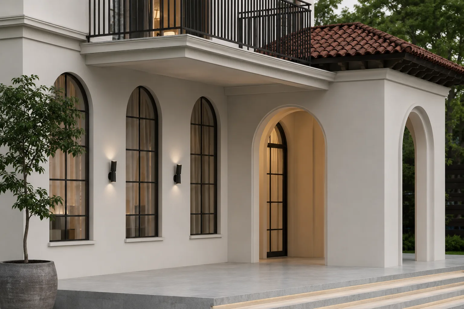 Close-up of arched openings and stucco detailing.