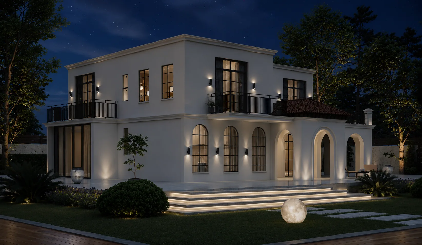 A contemporary villa at night, warm interior light glowing through arched openings and balconies.